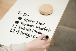 Illustration for article titled This Desk Keeps Your Cords In Order and Has a Built-In Whiteboard